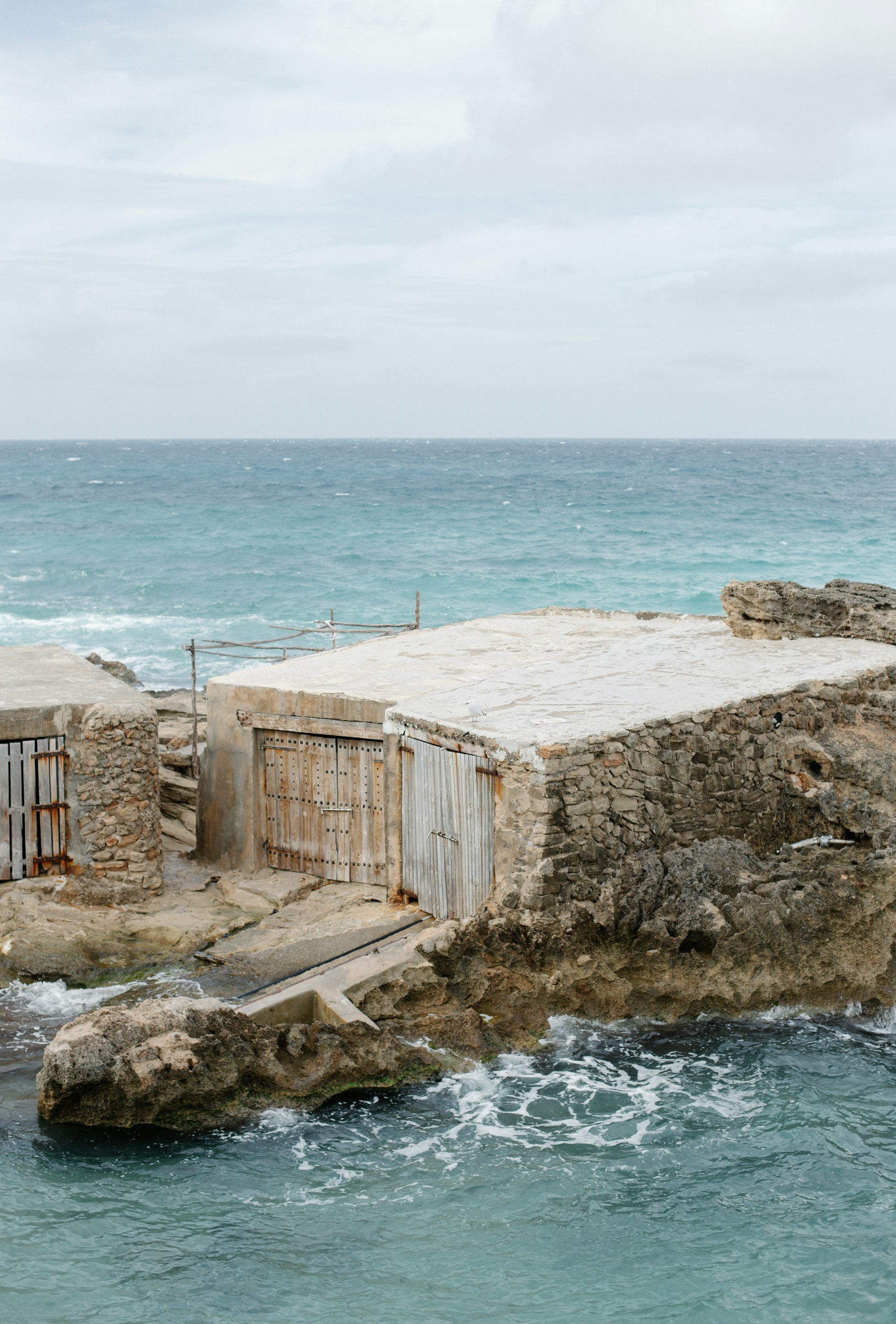 Coastline with a home under construction overlooking the ocean